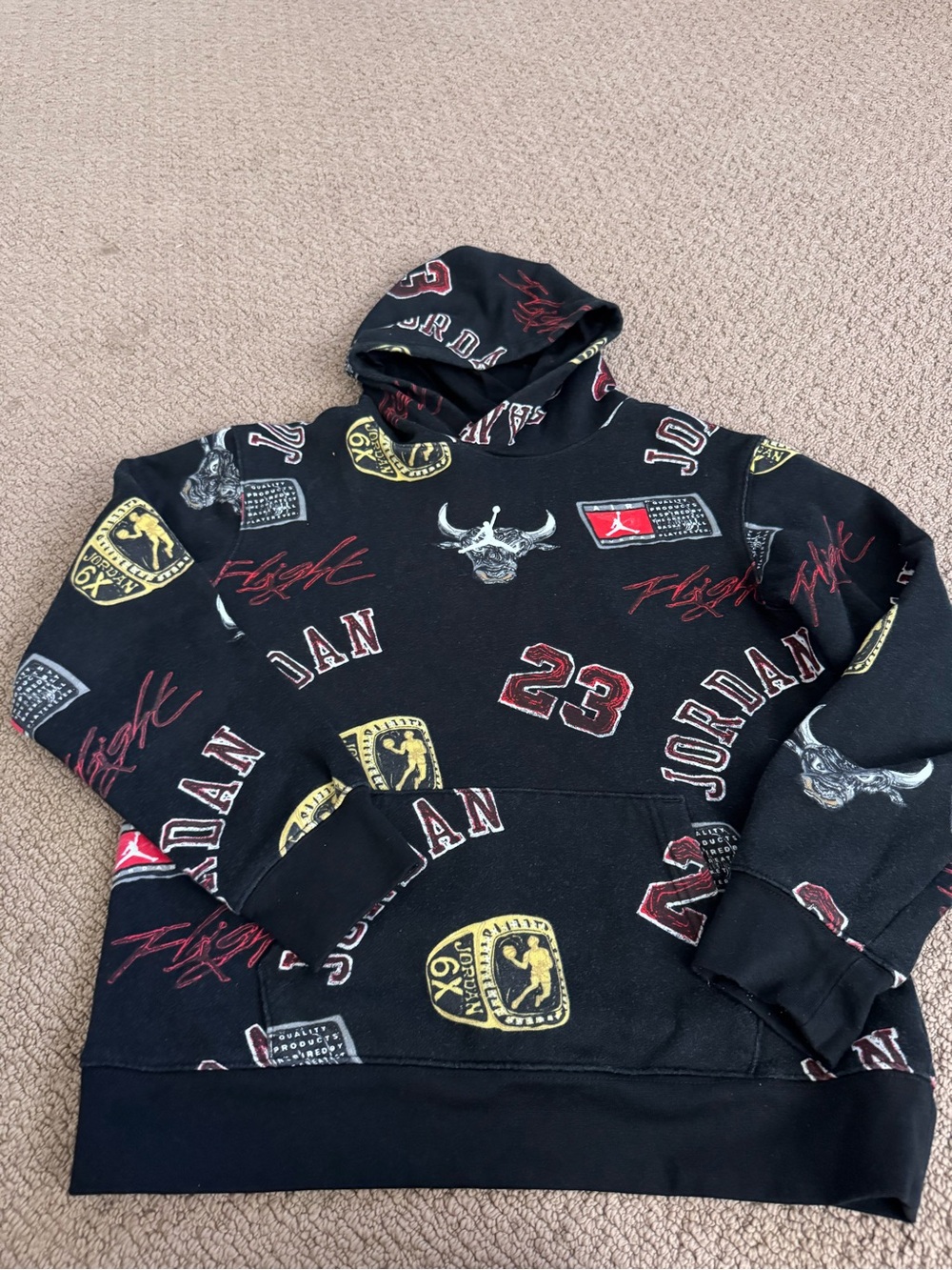 Jordan Black Allover Logo Graphic Pullover Hoodie with Red and Yellow Accents